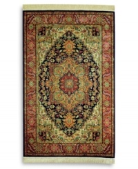 A beautiful example of traditional heriz designs, this rug features a bold navy center medallion surrounded by intricate florals in lighter shades of red and green. The combination of graceful lines and geometric shapes creates an exquisitely balanced pattern. Each color is individually skein-dyed for jewel-tone clarity. A patented wash process creates a vintage finish faithful to the craftsmanship of the original. Woven in the USA of premium fully worsted New Zealand wool. A beautiful example of traditional heriz designs, this rug features a bold navy center medallion surrounded by intricate florals in lighter shades of red and green. The combination of graceful lines and geometric shapes creates an exquisitely balanced pattern. Each color is individually skein-dyed for jewel-tone clarity. A patented wash process creates a vintage finish faithful to the craftsmanship of the original. Woven in the USA of premium fully worsted New Zealand wool.