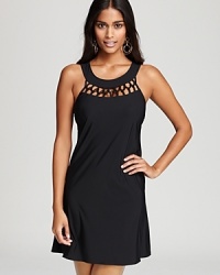 Retro-right, '60s inspired cutouts add flair to a basic little black dress-style swimsuit coverup. It will pair well with all your swimwear wardrobe favorites, or the matching monokini.