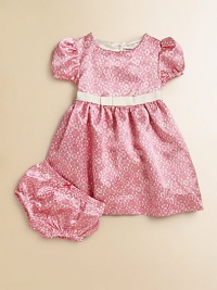 A pretty lace print on lustrous satin charmeuse makes the loveliest party dress for your little princess.Round necklineShort puffed sleevesBack button closeEmpire grosgrain ribbon waist with bowFull skirtFully lined in satinMatching bloomers with elasticized waist and leg openingsPolyesterMachine washImported Please note: Number of buttons may vary depending on size ordered. A pretty lace print on lustrous satin charmeuse makes the loveliest party dress for your little princess.Round necklineShort puffed sleevesBack button closeEmpire grosgrain ribbon waist with bowFull skirtFully lined in satinMatching bloomers with elasticized waist and leg openingsPolyesterMachine washImported Please note: Number of buttons may vary depending on size ordered.