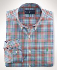 A bold, bright plaid pattern enlivens a preppy short-sleeved shirt, tailored for a comfortable, classic fit from crisp cotton poplin. A bold, bright plaid pattern enlivens a preppy short-sleeved shirt, tailored for a comfortable, classic fit from crisp cotton poplin.