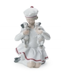 The essence of adorable, a little girl cuddles with two Dalmation puppies in this irresistible Lladro figurine of delicately glazed porcelain. The essence of adorable, a little girl cuddles with two Dalmation puppies in this irresistible Lladro figurine of delicately glazed porcelain.