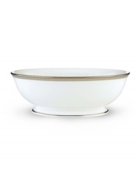 Metropolitan sensibility and modern design combine in this understated white bone china vegetable bowl from Lenox's collection of dinnerware and dishes. Platinum gild along the edge is enhanced by a clean, platinum geometric pattern reminiscent of architectural accents. Metropolitan sensibility and modern design combine in this understated white bone china vegetable bowl from Lenox's collection of dinnerware and dishes. Platinum gild along the edge is enhanced by a clean, platinum geometric pattern reminiscent of architectural accents.
