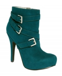 Shiny buckles on the Gileza booties by G by GUESS capture the spotlight thanks to the contrast against the suede-like material. Shiny buckles on the Gileza booties by G by GUESS capture the spotlight thanks to the contrast against the suede-like material.