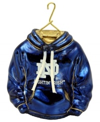 Fitting for Notre Dame alum, this hand-painted hoodie ornament trims the tree in Fighting Irish style. Glitter amps up the school and holiday spirit. Fitting for Notre Dame alum, this hand-painted hoodie ornament trims the tree in Fighting Irish style. Glitter amps up the school and holiday spirit.
