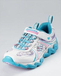 Go straight to the moon with Skechers. The Litebeam sneaker is crafted in a lightweight leather and mesh combination and adorned with dazzling details, making it a fun and functional addition to her active wardrobe. Go straight to the moon with Skechers. The Litebeam sneaker is crafted in a lightweight leather and mesh combination and adorned with dazzling details, making it a fun and functional addition to her active wardrobe.