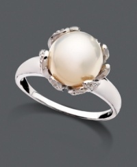 A polished pearl is the focal point of this fresh flower. Ring by Belle de Mer features a smooth sterling silver band and setting with sparkling, diamond-accented petals and a cultured freshwater pearl center (10-11 mm). Size 7. A polished pearl is the focal point of this fresh flower. Ring by Belle de Mer features a smooth sterling silver band and setting with sparkling, diamond-accented petals and a cultured freshwater pearl center (10-11 mm). Size 7.