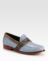 A traditional loafer style is redefined by colorful contrasts, in finely textured leather.Leather upperLeather liningPadded insoleLeather soleImported