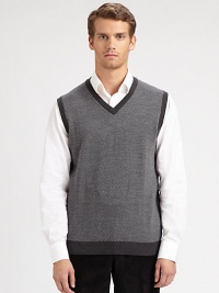 Add instant style with this herringbone-knit layer with bold contrast trim.V-neckSleevelessContrast ribbed details at collar, arm openings and hemMerino woolDry cleanImported Add instant style with this herringbone-knit layer with bold contrast trim.V-neckSleevelessContrast ribbed details at collar, arm openings and hemMerino woolDry cleanImported