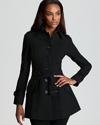 Burberry London updates the classic trench with a cropped silhouette for modern, feminine style. Burberry London updates the classic trench with a cropped silhouette for modern, feminine style.