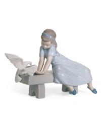 Feathered friends. Three little birds eat right out of the hands of a gentle young lady dressed in a pretty blue dress and shoes. A classic Lladro collectible in handcrafted porcelain. Feathered friends. Three little birds eat right out of the hands of a gentle young lady dressed in a pretty blue dress and shoes. A classic Lladro collectible in handcrafted porcelain.