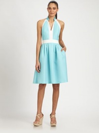 Lustrous satin piqué, tailored in a classic halter silhouette and accented with contrast trim.Stand collarHalter necklineBanded waistSide slash pocketsConcealed back zipFully linedAbout 23 from natural waist58% polyester/17% acrylic/17% wool/8% acetateDry cleanImportedModel shown is 5'10½ (179cm) wearing US size 4. Lustrous satin piqué, tailored in a classic halter silhouette and accented with contrast trim.Stand collarHalter necklineBanded waistSide slash pocketsConcealed back zipFully linedAbout 23 from natural waist58% polyester/17% acrylic/17% wool/8% acetateDry cleanImportedModel shown is 5'10½ (179cm) wearing US size 4.
