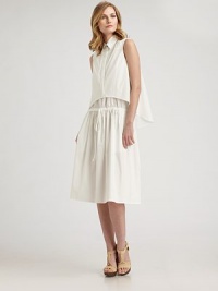 An intriguing poplin design featuring a collar-neck vest and comfortable, drawstring waist skirt.Collar neckSleevelessConcealed button frontDrawstring waistFront and back yokeAbout 32 from natural waist96% cotton/4% polyurethaneDry cleanMade in USA of imported fabric Model shown is 5'10½ (179cm) wearing US size 4. An intriguing poplin design featuring a collar-neck vest and comfortable, drawstring waist skirt.Collar neckSleevelessConcealed button frontDrawstring waistFront and back yokeAbout 32 from natural waist96% cotton/4% polyurethaneDry cleanMade in USA of imported fabric Model shown is 5'10½ (179cm) wearing US size 4.