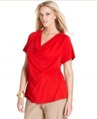 A draped neckline and gathered front lend chic appeal to Calvin Klein's short sleeve plus size top-- finish the look with your go-to casual bottoms. A draped neckline and gathered front lend chic appeal to Calvin Klein's short sleeve plus size top-- finish the look with your go-to casual bottoms.