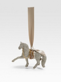 This jaunty stallion in handcrafted in shimmering glass glitter, accented with a chain and beaded trim, and suspended from a satin ribbon loop.Satin ribbon loopGlass glitterChain and beaded trim5 X 4 X 1.5Handmade in USA This jaunty stallion in handcrafted in shimmering glass glitter, accented with a chain and beaded trim, and suspended from a satin ribbon loop.Satin ribbon loopGlass glitterChain and beaded trim5 X 4 X 1.5Handmade in USA