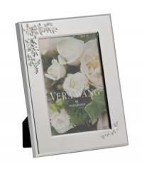 Crafted of lustrous silver plate with delicately etched blooms, the Vera Lace Bouquet picture frame from Vera Wang showcases wedding photos and other special moments with extraordinary grace. Crafted of lustrous silver plate with delicately etched blooms, the Vera Lace Bouquet picture frame from Vera Wang showcases wedding photos and other special moments with extraordinary grace.