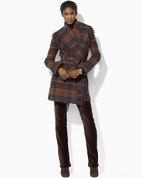 A wide shawl collar and unique fringed details lend modern sophistication to a soft wool-blend jacket. A wide shawl collar and unique fringed details lend modern sophistication to a soft wool-blend jacket.