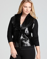 Proving too much is never enough, this Jones New York Collection Plus cardigan melds high-shine sequins with sumptuous faux fur for a head-turning style. Proving too much is never enough, this Jones New York Collection Plus cardigan melds high-shine sequins with sumptuous faux fur for a head-turning style.