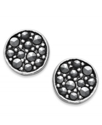 Punch up your look with a ton of sparkle. Studio Silver's pretty stud earrings feature a sterling silver setting with round-cut marcasite at the center. Approximate diameter: 2-1/2 inches. Punch up your look with a ton of sparkle. Studio Silver's pretty stud earrings feature a sterling silver setting with round-cut marcasite at the center. Approximate diameter: 2-1/2 inches.