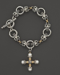 An etched sterling silver and 18K yellow gold link bracelet embellished with a pearl-accented cross. By Konstantino.