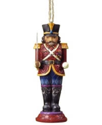 Standing guard at your tree, the Nutcracker soldier ornament is an instant holiday classic. Elaborate carved and patterned detail give him the traditional charm of Jim Shore. Standing guard at your tree, the Nutcracker soldier ornament is an instant holiday classic. Elaborate carved and patterned detail give him the traditional charm of Jim Shore.