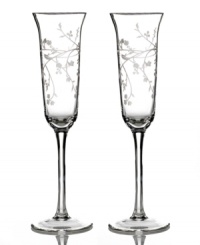 Utterly romantic, the Trousseau toasting flutes from Martha Stewart Collection feature a feminine tulip shape and etched florals in clear glass. Perfect for the happy couple. Utterly romantic, the Trousseau toasting flutes from Martha Stewart Collection feature a feminine tulip shape and etched florals in clear glass. Perfect for the happy couple.