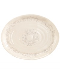 Homegrown style. An organic shape and engraved florals give the Espana Antica platter a handcrafted feel that suits country settings. From the Tabletops Unlimited dinnerware collection. Homegrown style. An organic shape and engraved florals give the Espana Antica platter a handcrafted feel that suits country settings. From the Tabletops Unlimited dinnerware collection.