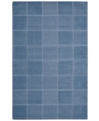 An a-tonal blocked design in lush blue creates a sophisticated, modern accent in the Westport area rug from Nourison. Hand-tufted in India of pure wool for premium softness and durability. An a-tonal blocked design in lush blue creates a sophisticated, modern accent in the Westport area rug from Nourison. Hand-tufted in India of pure wool for premium softness and durability.