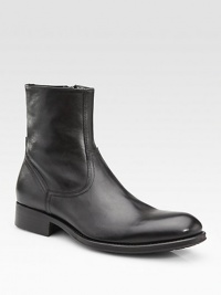 Superb craftsmanship with a handmade touch, designed in hand-burnished leather with a side zip for easy on and off. Leather lining Padded insole Leather/rubber sole Made in Italy Superb craftsmanship with a handmade touch, designed in hand-burnished leather with a side zip for easy on and off. Leather lining Padded insole Leather/rubber sole Made in Italy