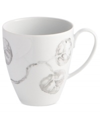 Michael Aram branches out from his renowned metal collection with the Botanical Leaf mug. Simple foliage rooted in fine Limoges porcelain brings a lightness and ease to modern tables in shades of gray. Michael Aram branches out from his renowned metal collection with the Botanical Leaf mug. Simple foliage rooted in fine Limoges porcelain brings a lightness and ease to modern tables in shades of gray.