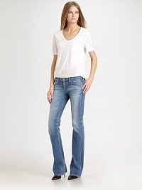 Sleek five-pocket stretch denim in a sexy bootcut silhouette.THE FITFitted through hips and thighsRise, about 7Inseam, about 34THE DETAILSZip flyFive-pocket styleSignature stitch back patch pockets55% cotton/43% lyocell/2% polyurethaneMachine washMade in USA of imported fabricModel shown is 5'10 (177cm) wearing US size 4. Sleek five-pocket stretch denim in a sexy bootcut silhouette.THE FITFitted through hips and thighsRise, about 7Inseam, about 34THE DETAILSZip flyFive-pocket styleSignature stitch back patch pockets55% cotton/43% lyocell/2% polyurethaneMachine washMade in USA of imported fabricModel shown is 5'10 (177cm) wearing US size 4.