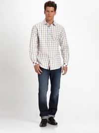 Checked windowpane pattern, in a colorful array, refreshes this cotton classic with contrast trim of the cuffs for an unexpected twist.Button-frontPoint collarCottonDry cleanImported Checked windowpane pattern, in a colorful array, refreshes this cotton classic with contrast trim of the cuffs for an unexpected twist.Button-frontPoint collarCottonDry cleanImported