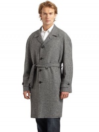 THE LOOKNotched lapelButton closureDual welt pocketsLong sleeves with tab accentsBelted waistVented back hemTHE FITAbout 40 from shoulder to hemTHE MATERIALWorsted woolFully linedCARE & ORIGINDry cleanMade in USA THE LOOKNotched lapelButton closureDual welt pocketsLong sleeves with tab accentsBelted waistVented back hemTHE FITAbout 40 from shoulder to hemTHE MATERIALWorsted woolFully linedCARE & ORIGINDry cleanMade in USA