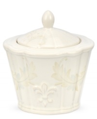 With embossed lilies and golden leaves, Portmeirion's decorated Fleur de Lys sugar bowl sets tables in the French tradition. Classic, scalloped stoneware in warm ivory lends distinct old-world elegance to everyday dining. With embossed lilies and golden leaves, Portmeirion's decorated Fleur de Lys sugar bowl sets tables in the French tradition. Classic, scalloped stoneware in warm ivory lends distinct old-world elegance to everyday dining.