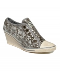 Street-wise style with fashion sense: The Bitt 400 wedge sneakers by Nine West Original feature classic sneaker design with an added, on-trend wedge. Street-wise style with fashion sense: The Bitt 400 wedge sneakers by Nine West Original feature classic sneaker design with an added, on-trend wedge.