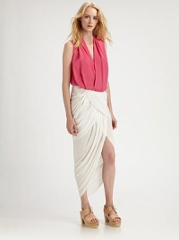 A dramatic design featuring curve-flattering draped details and a seductive asymmetrical hem.Side zipperFlattering gathered detailsAsymmetrical hemAbout 39 longViscoseDry cleanMade in USA Model shown is 5'10½ (179cm) wearing US size 4. A dramatic design featuring curve-flattering draped details and a seductive asymmetrical hem.Side zipperFlattering gathered detailsAsymmetrical hemAbout 39 longViscoseDry cleanMade in USA Model shown is 5'10½ (179cm) wearing US size 4.