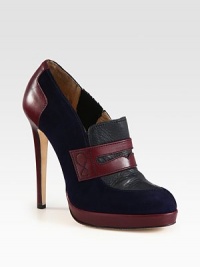 This loafer-inspired platform silhouette is on-trend with colorblock panels of leather and suede. Leather-covered heel, 5 (125mm)Leather platform, ¾ (20mm)Compares to a 4¼ heel (110mm)Leather and suede upperSide elastic goreLeather lining and solePadded insoleMade in ItalyOUR FIT MODEL RECOMMENDS ordering one size up as this style runs small. This loafer-inspired platform silhouette is on-trend with colorblock panels of leather and suede. Leather-covered heel, 5 (125mm)Leather platform, ¾ (20mm)Compares to a 4¼ heel (110mm)Leather and suede upperSide elastic goreLeather lining and solePadded insoleMade in ItalyOUR FIT MODEL RECOMMENDS ordering one size up as this style runs small.