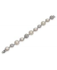 The perfect combination of elegance and grace. This frosty white bracelet by Carolee features glass crystal stones and glass pearls. Crafted in rhodium-plated mixed metal. Approximate length: 7-3/4 inches.
