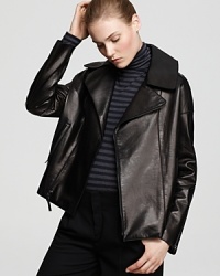 A reinterpretation of the iconic 1950s motorcycle jacket with clean, feminine lines in soft, polished leather, this soft leather jacket remains a timeless fashion staple for every woman's fall wardrobe. A reinterpretation of the iconic 1950s motorcycle jacket with clean, feminine lines in soft, polished leather, this soft leather jacket remains a timeless fashion staple for every woman's fall wardrobe.