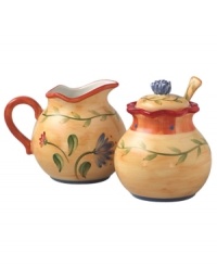 With a Tuscan-inspired pattern in warm, sun-drenched colors, this sugar and creamer set evokes cozy, casual meals in the Italian countryside. Sugar spoon fits beautifully between the bowl's notched lid and scalloped rim. From Pfaltzgraff's collection of dinnerware and dishes. With a Tuscan-inspired pattern in warm, sun-drenched colors, this sugar and creamer set evokes cozy, casual meals in the Italian countryside. Sugar spoon fits beautifully between the bowl's notched lid and scalloped rim. From Pfaltzgraff's collection of dinnerware and dishes.