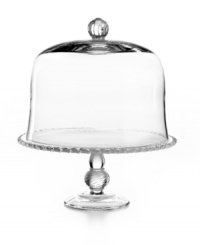 This pressed glass cake stand steals the spotlight at casual tables with fluted detail, beaded trim and a dramatic dome. From Martha Stewart Collection. This pressed glass cake stand steals the spotlight at casual tables with fluted detail, beaded trim and a dramatic dome. From Martha Stewart Collection.