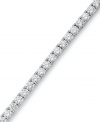 The perfect serve. Arabella's stunning tennis bracelet combines dozens of round-cut Swarovski zirconias (20-1/4 ct. t.w.) in polished sterling silver. Approximate length: 7 inches.