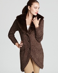 A luxe approach to layering, this Jones New York Collection cardigan tops a sumptuous wool silhouette with a plush faux-fur collar for a sophisticated play on texture. A luxe approach to layering, this Jones New York Collection cardigan tops a sumptuous wool silhouette with a plush faux-fur collar for a sophisticated play on texture.