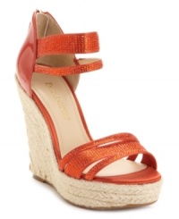 The perfect summer style. Enzo Angiolini's Isty espadrille platform wedge sandals feature embellishments across the straps and a sweet zipper up the back. The perfect summer style. Enzo Angiolini's Isty espadrille platform wedge sandals feature embellishments across the straps and a sweet zipper up the back.