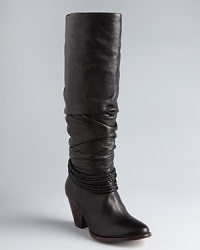 Ella Moss takes her relaxed ready-to-wear aesthetic into scrunched boots, with subtle, wear-everyday Western details. Ella Moss takes her relaxed ready-to-wear aesthetic into scrunched boots, with subtle, wear-everyday Western details.