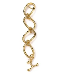 Bold gold-plated links are a sculptural statement on this Robert Lee Morris Soho bracelet, lending this simple piece modern allure. Bold gold-plated links are a sculptural statement on this Robert Lee Morris Soho bracelet, lending this simple piece modern allure.