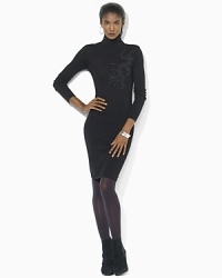 A soft merino wool dress is detailed with a glistening embroidered dragon and luxe faceted buttons at the neckline for exotic appeal. A soft merino wool dress is detailed with a glistening embroidered dragon and luxe faceted buttons at the neckline for exotic appeal.