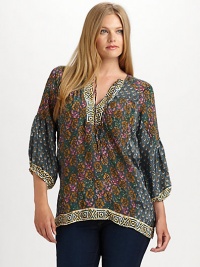 A contrasting tribal print flawlessly complements this printed silk top. Pair this relaxed-fit blouse with slim-fitting pants or skinny jeans.Self-tie detail at necklineThree-quarter sleevesAllover printContrasting trimBack yokeAbout 29 from shoulder to hemSilkDry cleanImported A contrasting tribal print flawlessly complements this printed silk top. Pair this relaxed-fit blouse with slim-fitting pants or skinny jeans.Self-tie detail at necklineThree-quarter sleevesAllover printContrasting trimBack yokeAbout 29 from shoulder to hemSilkDry cleanImported