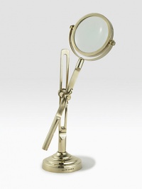 This fully functioning standing magnifier is crafted in a vintage-inspired silhouette from antiqued brass. 11½H X 4 diam.Brass and glassImported This fully functioning standing magnifier is crafted in a vintage-inspired silhouette from antiqued brass. 11½H X 4 diam.Brass and glassImported
