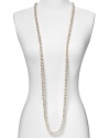 Luminous and versatile. Pearls are always a classic, and lengthy strand from Majorica is a delicate way to wear them.