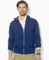 Crafted from lightweight fleece for easy on-the-go styling, a classic full-zip hoodie gets a bold update with a printed pattern inside the hood. Crafted from lightweight fleece for easy on-the-go styling, a classic full-zip hoodie gets a bold update with a printed pattern inside the hood.